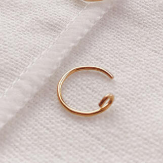 Fake conch hoop earring